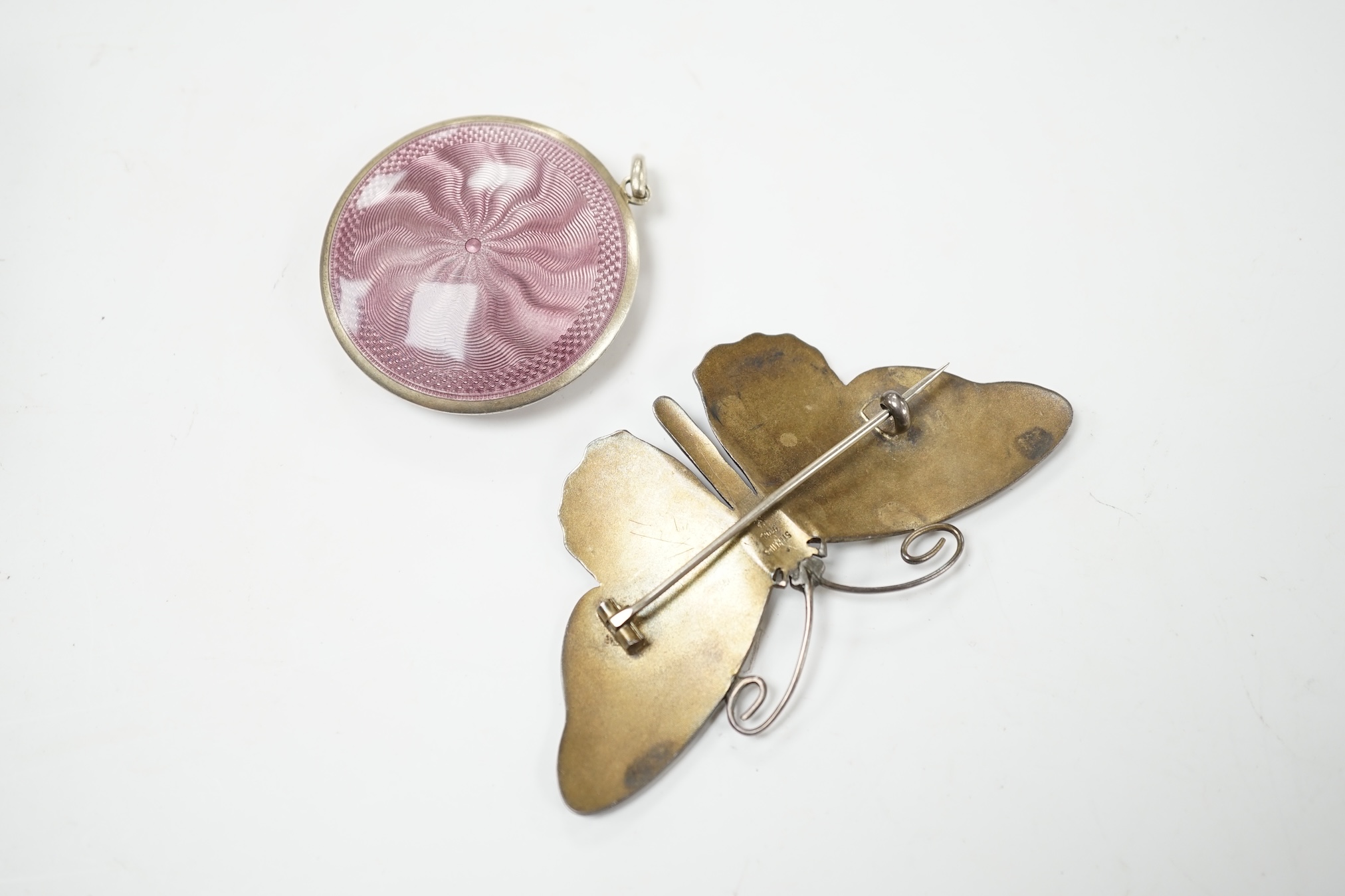 A Norwegian 925S and three colour enamel butterfly brooch, 8cm and a gilt white metal and enamel compact. Condition - poor to fair.